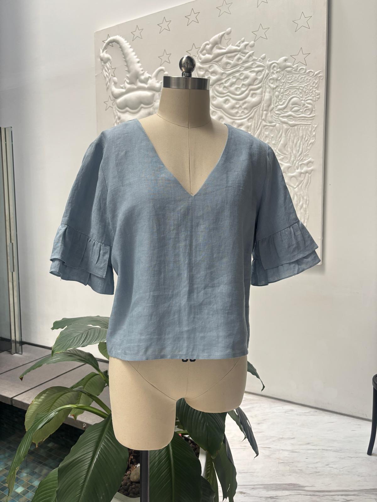 Linen blouse with ruffled sleeves