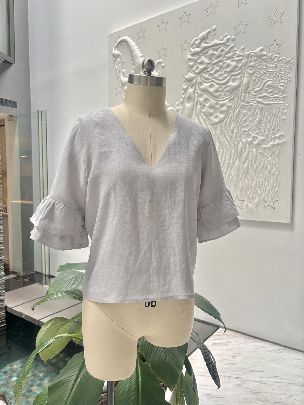 Linen blouse with ruffled sleeves